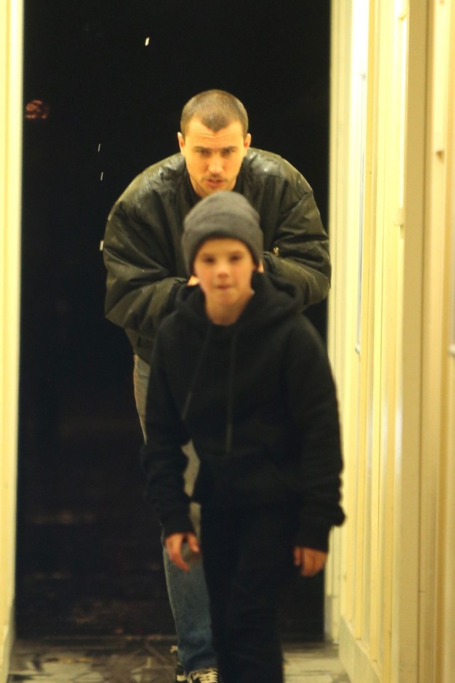 He wrapped up in a woolly hat and black jacket