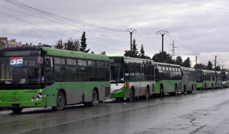 Buses which would have been used to evacuate civilians from Aleppo, pictured yesterday