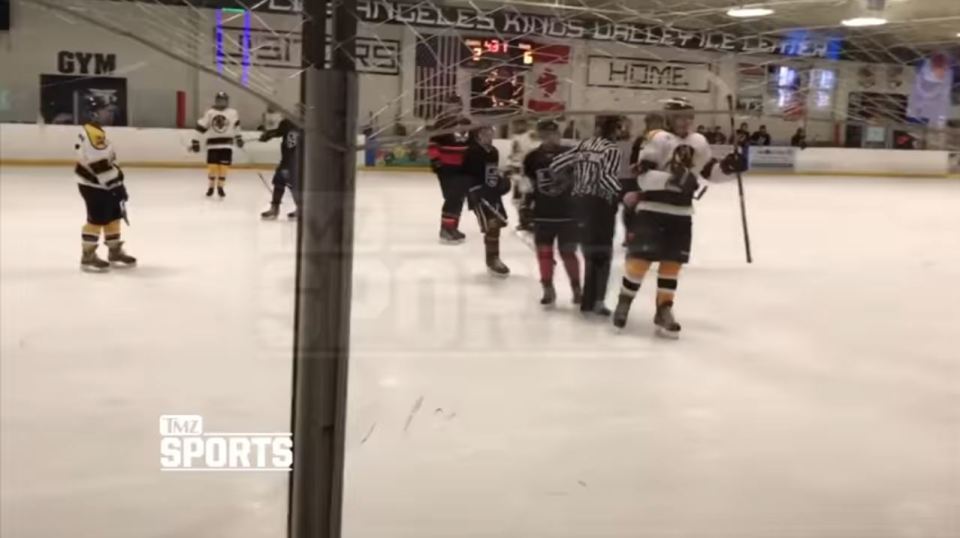  The popstar wanted to fight his opponent but the referee and other players intervened