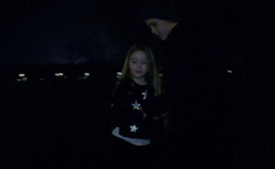  Cruz gives Harper a hand on the skate board