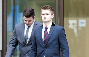Queen's Guard 'grabbed police officer around the throat while fellow soldier hurled racist abuse'