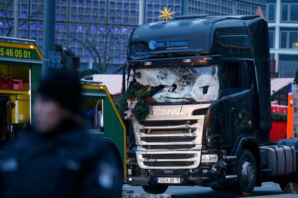  A manhunt is underway for the truck terrorist who careered into a Berlin Christmas market last night