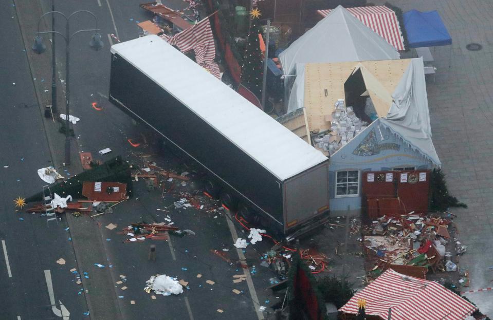 The destroyed Berlin Christmas market where 12 shoppers were killed last night