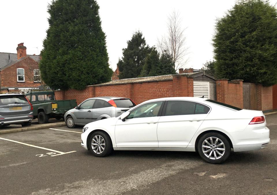  The woman returned to her vehicle loaded down with Christmas shopping