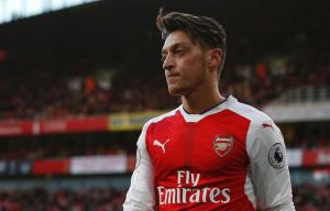 Mesut Ozil rediscovers dazzling touch as Arsenal labour to win against West Brom at the Emirates