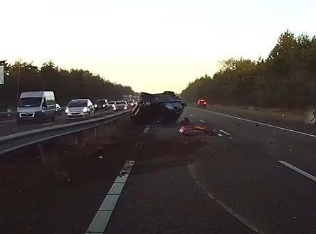  The huge off-roader flips and crashes into the central reservation