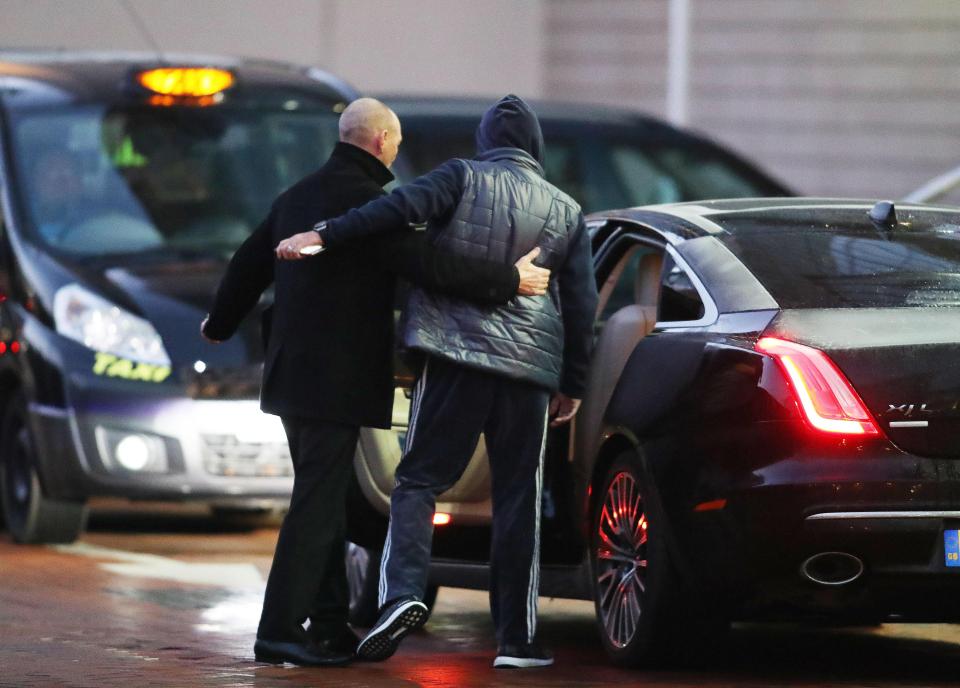 Mourinho is trying to keep warm in a gilet... 