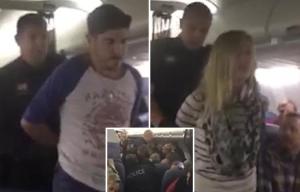 Frustrated passengers applaud and chant as 'violent' couple are marched off plane for abusing staff