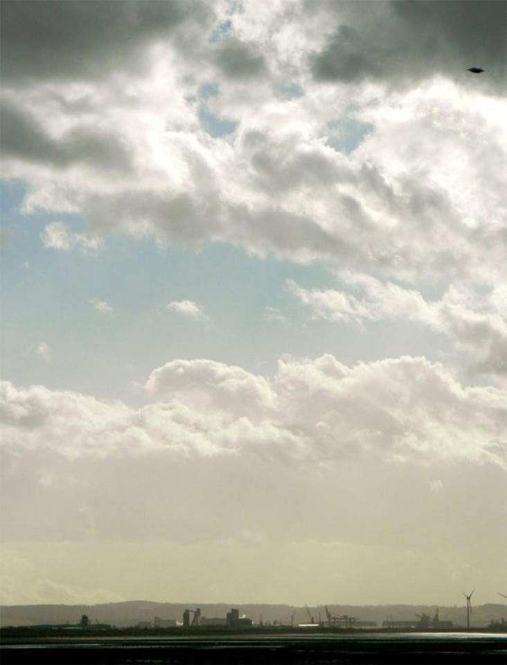 The weird black object can be seen in the top-right of the photo