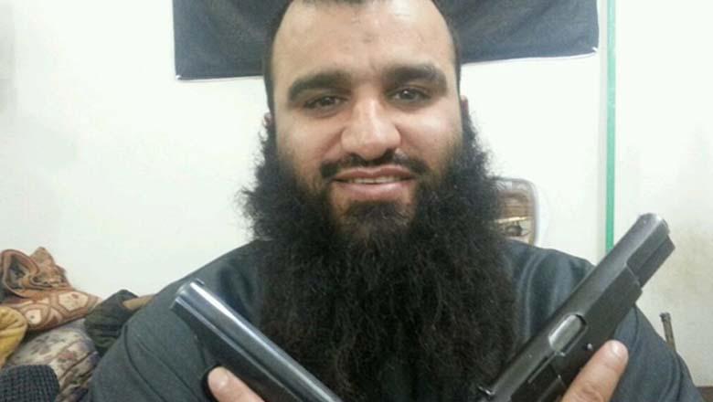 ISIS murderer Abu Abdel gloating with his guns