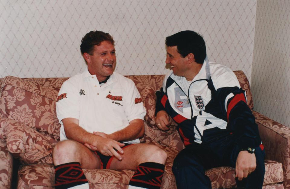 Taylor shares a joke with Paul Gascoigne on England duty