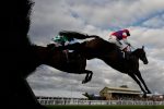 Sam Twiston-Davies riding Belmount (R) on their way to winning The bet365.com Silver Salver Handicap Steeple Chase at Hereford racecourse
