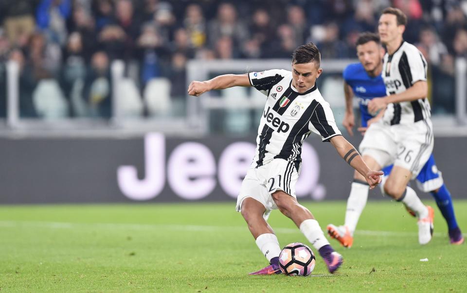 Paulo Dybala scores from the spot during Serie A victory over Udinese