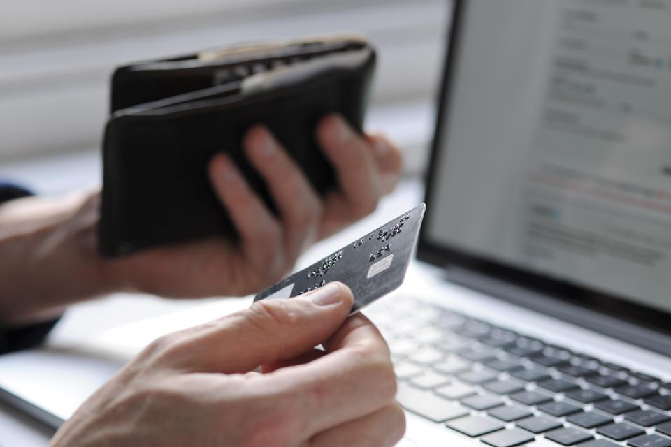 Credit card and laptop