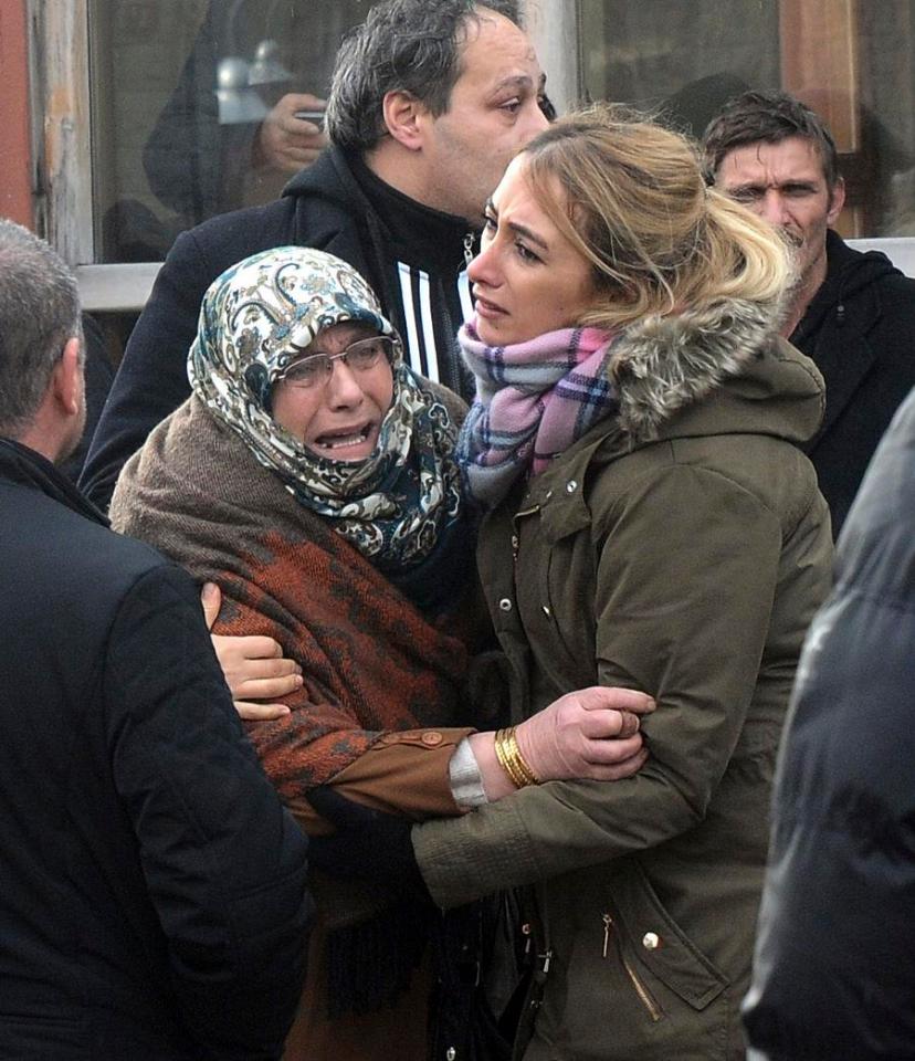 A woman screams after the death of a loved one in the nightclub attack 