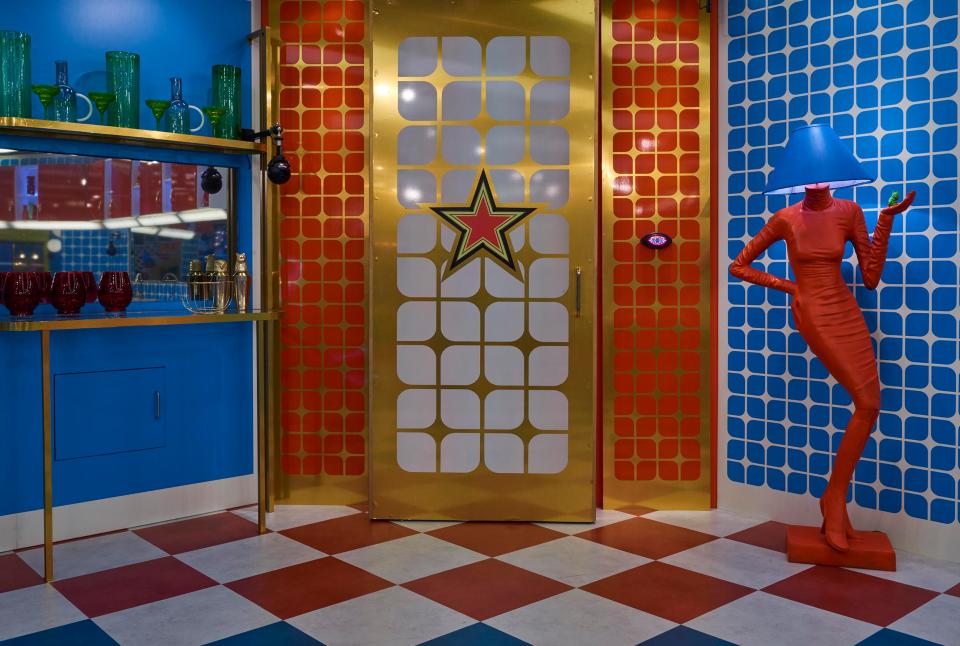 The entrance to the bungalow's most iconic room has been jazzed up with bright tiles