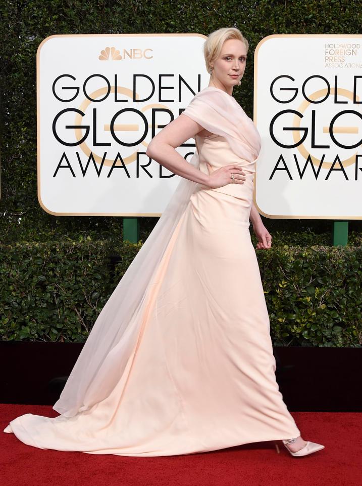  Gwendoline showed off her curves in a long peachy dress