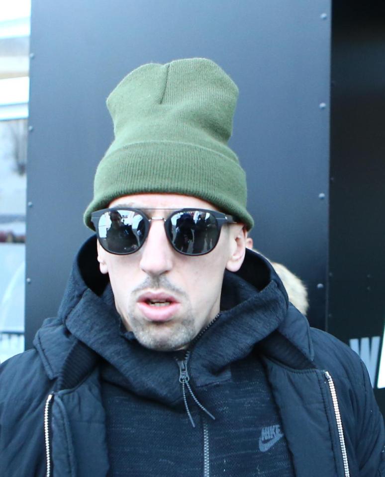  Whilst Ribery wore a black coat on top of a black Nike hoodie with a green hat