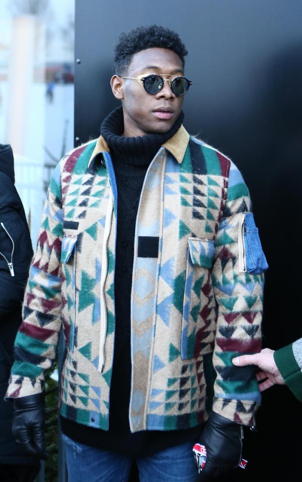  Alaba stood out with a multi-coloured jacket at the event