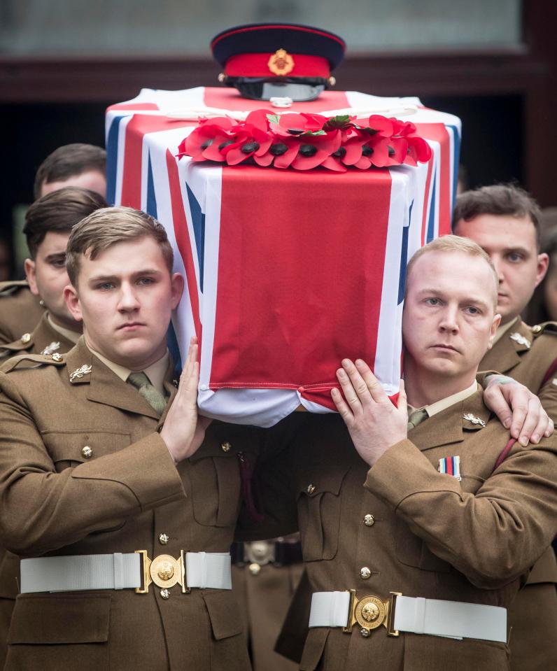 His coffin was draped in a Union Jack flag and carried by comrades from the 2nd Battalion