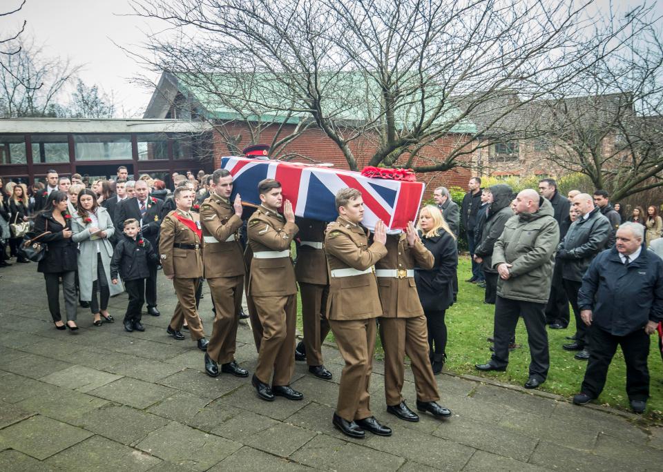 Hundreds of mourners turned out to line the streets outside the church in his hometown of Middleton, Greater Manchester today