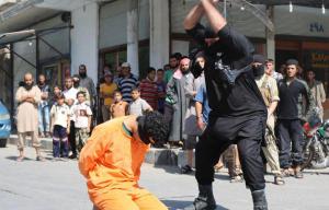 Giant Isis executioner who beheaded HUNDREDS of victims is knifed to death by mystery hit squad