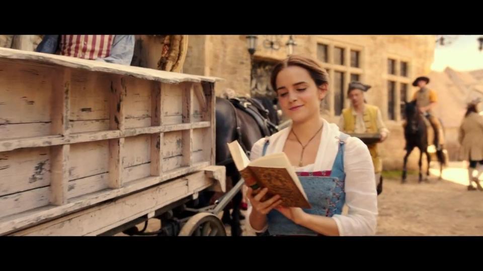 Emma Watson as Belle, with her "nose stuck in a book"...