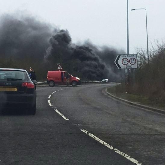 Thick plumes of black smoke could be seen across the A12 after the lorry plunged onto the dual carriageway
