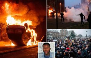 Chaos as rioters torch vehicles and attack cops in chaotic protest over alleged police rape of black youth