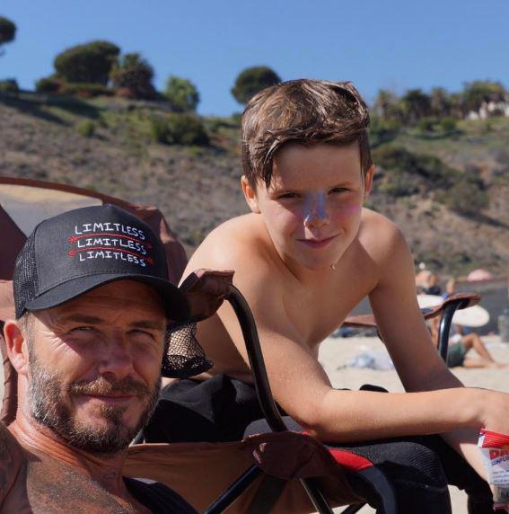  David uploaded a picture of him with son Cruz on the beach