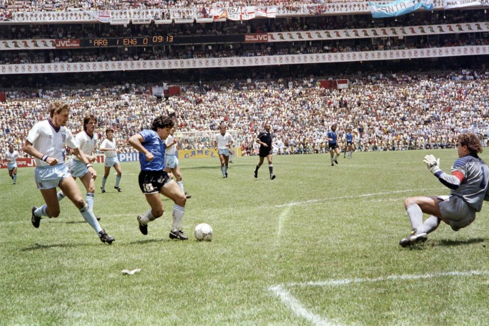 Diego Maradona steadies himself before rounding off England stopper, Peter Shilton