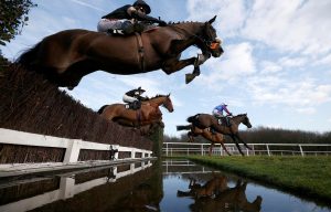 Runners clear the water at Leicester racecourse