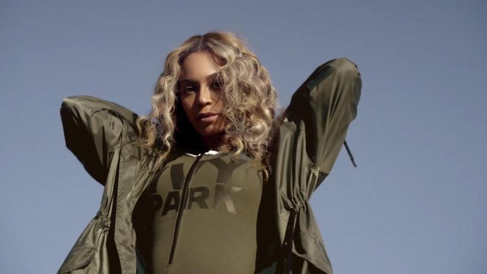  The khaki green body suit seemed to show a bit of a bump