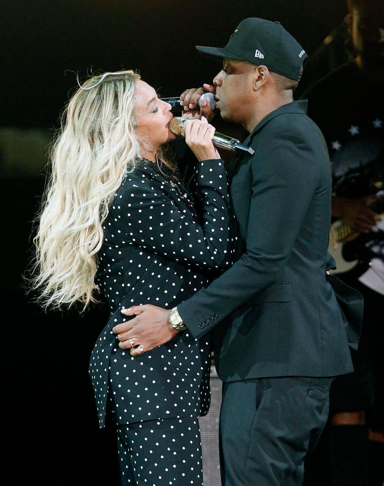  Also in November, Bey wore a black and white polka dot suit to perform with husband Jay Z at a rally for Hillary Clinton
