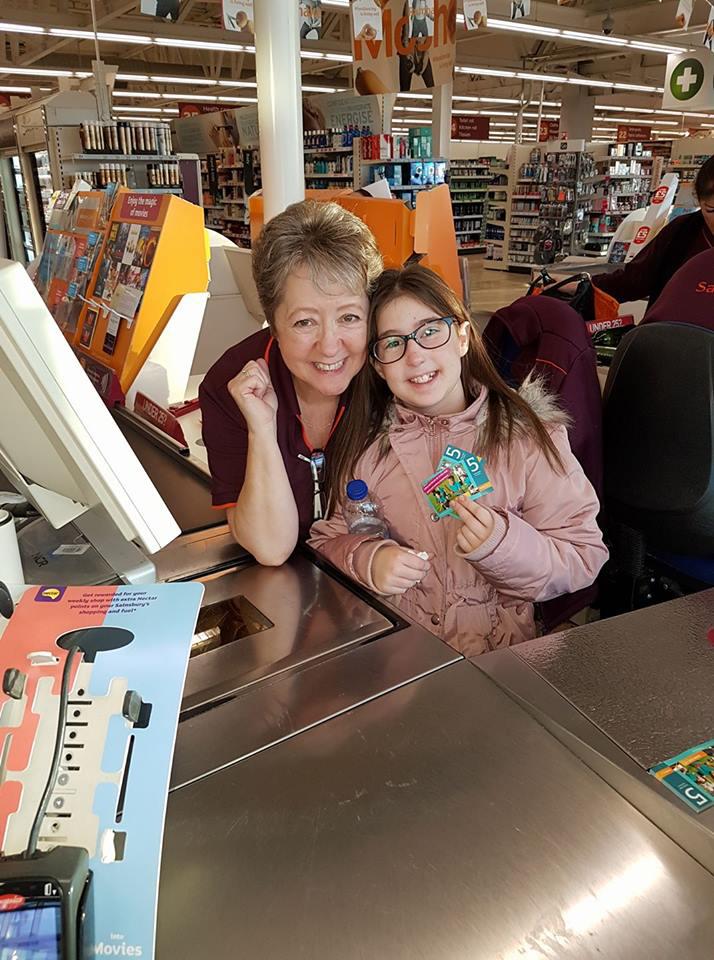  The Sainsbury's till worker comforted a tearful girl traumatised by lights suddenly dimming while she shopped with her mum