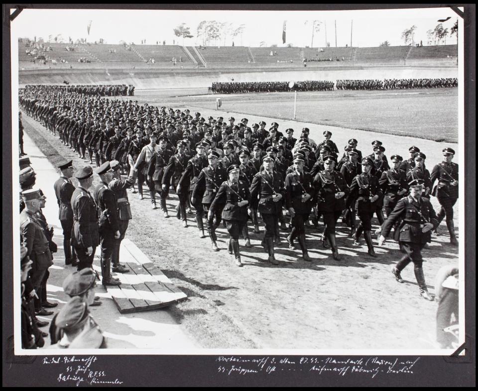 The album was recovered by US Army officer Philips Parks Ramsey after the war. pictured, SS soldiers on parade march
