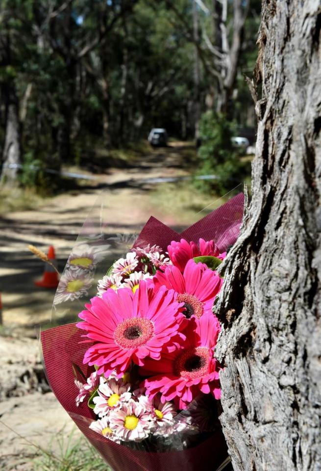  Flowers tied to a tree near where the body was found