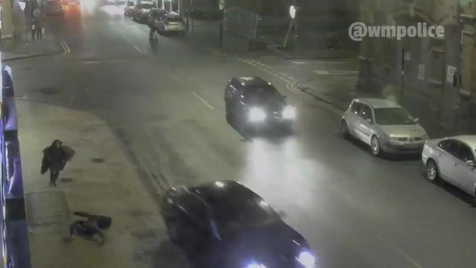 Her horrified mother rushes to her aid as she watches the BMW speed off from the scene on January 28