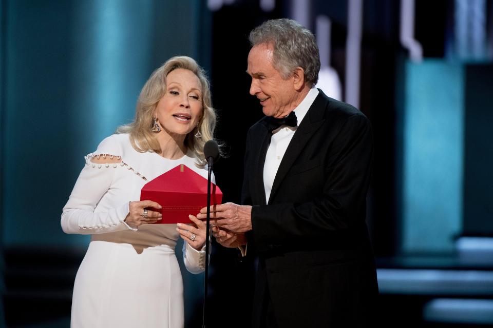 Faye Dunaway and Warren Beatty presenting on stage during the 89th annual Academy Awards ceremony at the Dolby Theatre in Hollywood, California