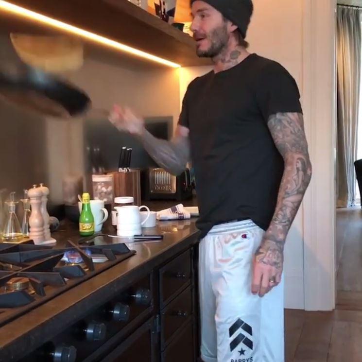 David Beckham embraces Pancake Day by cooking breakfast for the kids