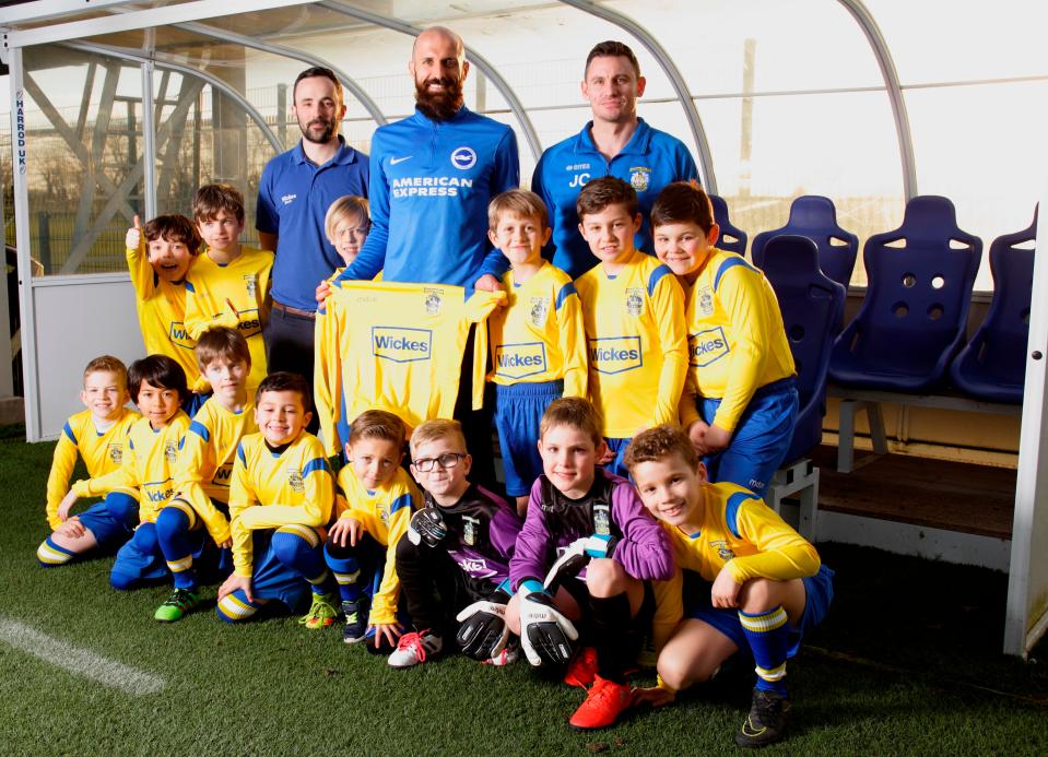Eastbourne FC were givwen brand new kits and the chance to meet Brighton skipper Bruno