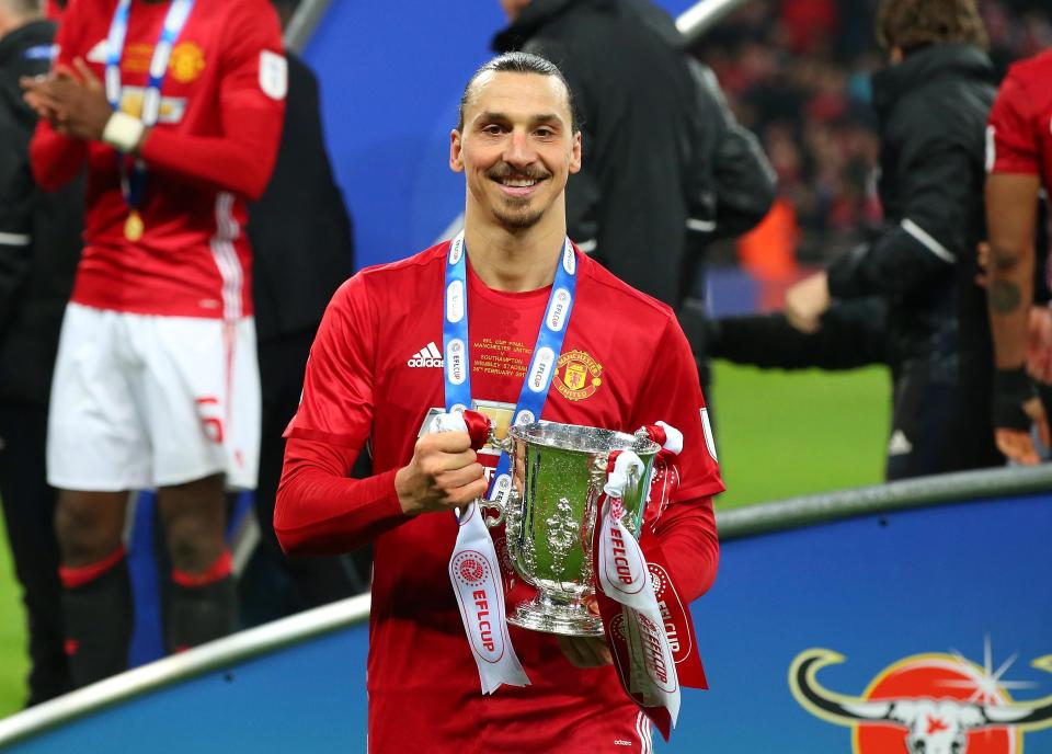 Zlatan Ibrahimovic poses with the EFL Cup after United won the final 3-2 against Southampton at Wembley
