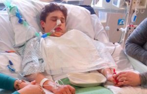 Family of boy, 14, share picture of him in a coma after his 'drink was spiked with ecstasy'