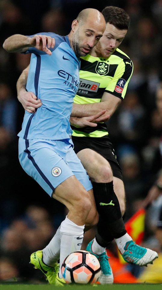 Zabaleta tangles with Huddersfields George Bunn