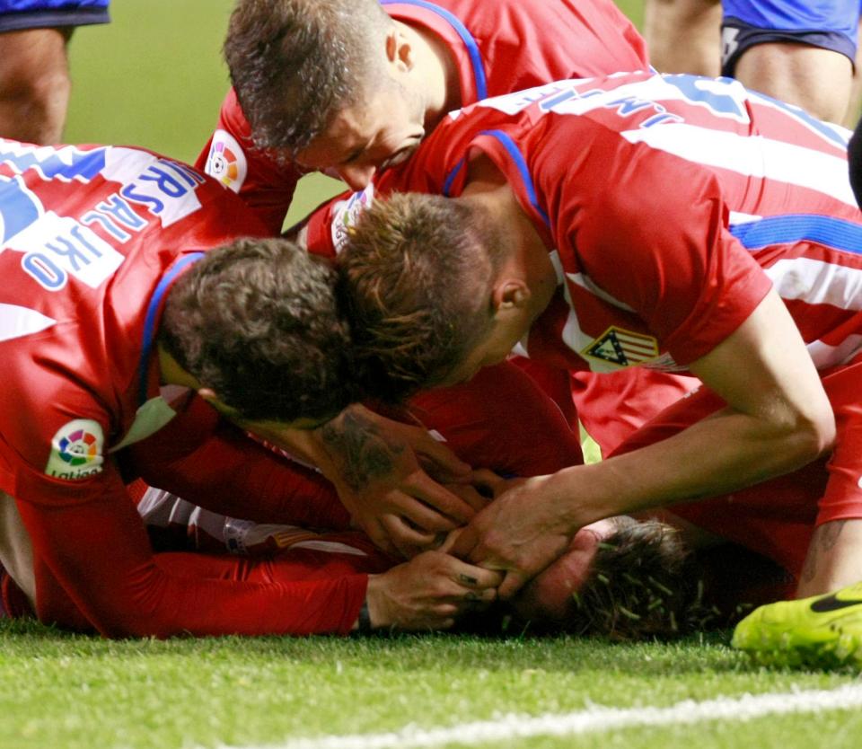Teammates rushed to help the Spanish icon out amid fears he'd swallowed his tongue