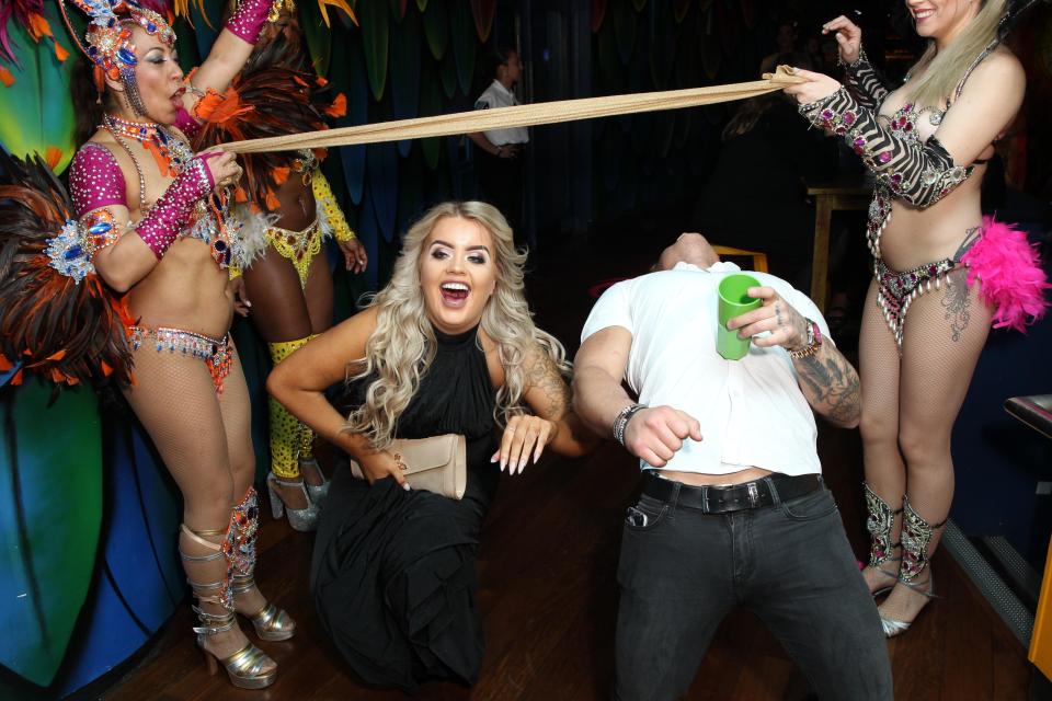  The couple took on the limbo side by side