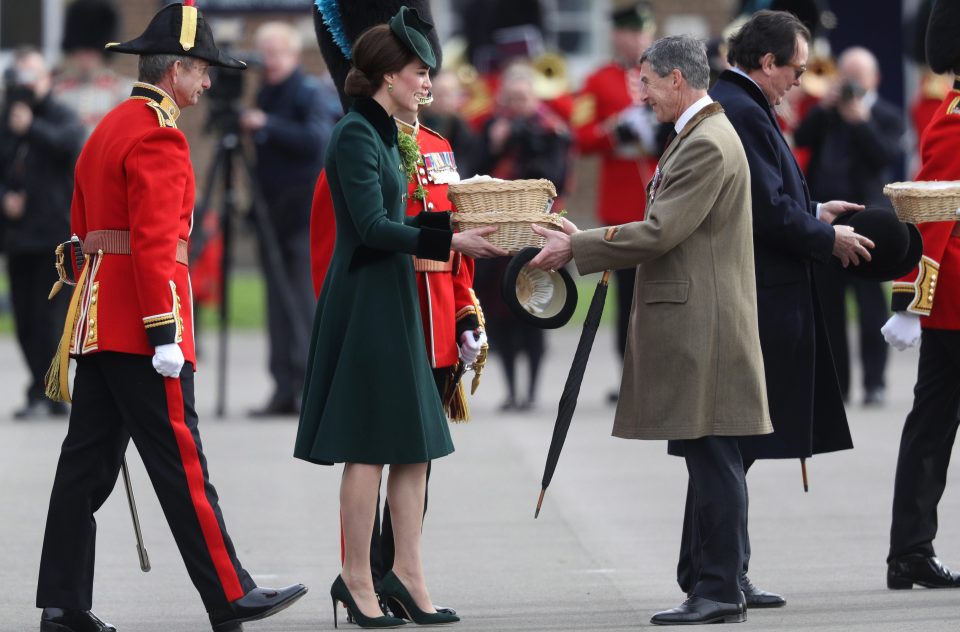  The Duchess of Cambridge presents the 1st Battalion Irish Guardsmen with sprigs of shamrocks during the annual Irish Guards' St Patrick's Day Parade at Household Cavalry Barracks