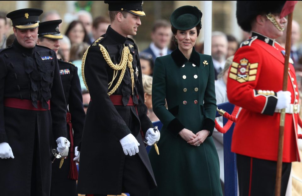  William wore his military uniform for the parade, while Kate dressed in a dark green coat and hat