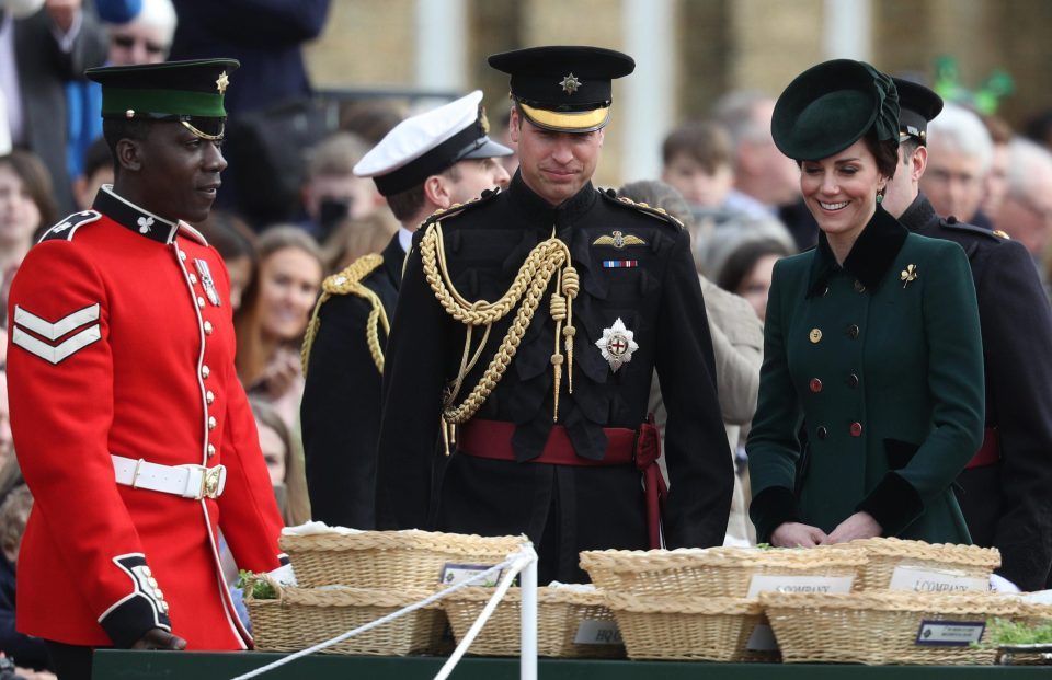  The Duke and Duchess pictured here infront of the baskets of shamrocks as they prepare to present them