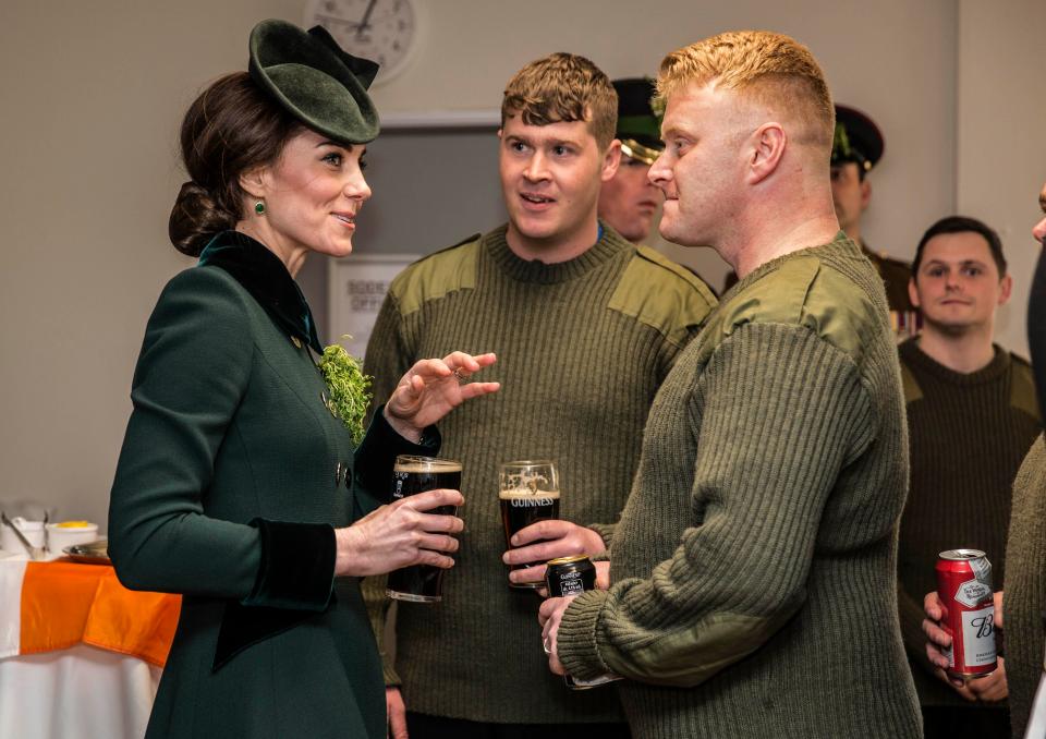  The Duchess chatted with some officers and guardsmen while drinking Guinness after the annual parade